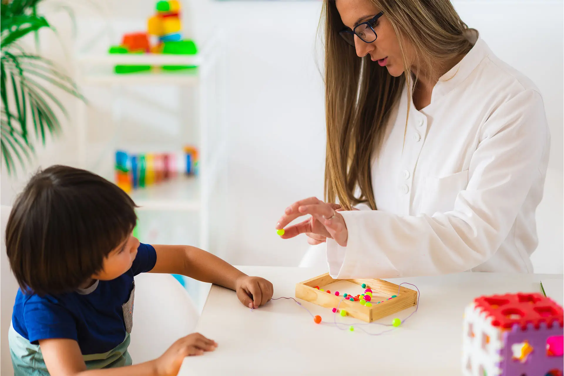 Montessori school special education setting with ABA therapy and guided learning.